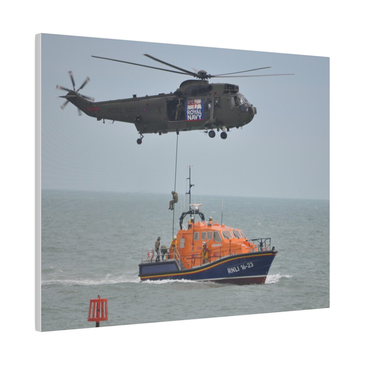 Sea King Helicopter Roping Down Crew Onto The RNLI Lifeboat Canvas