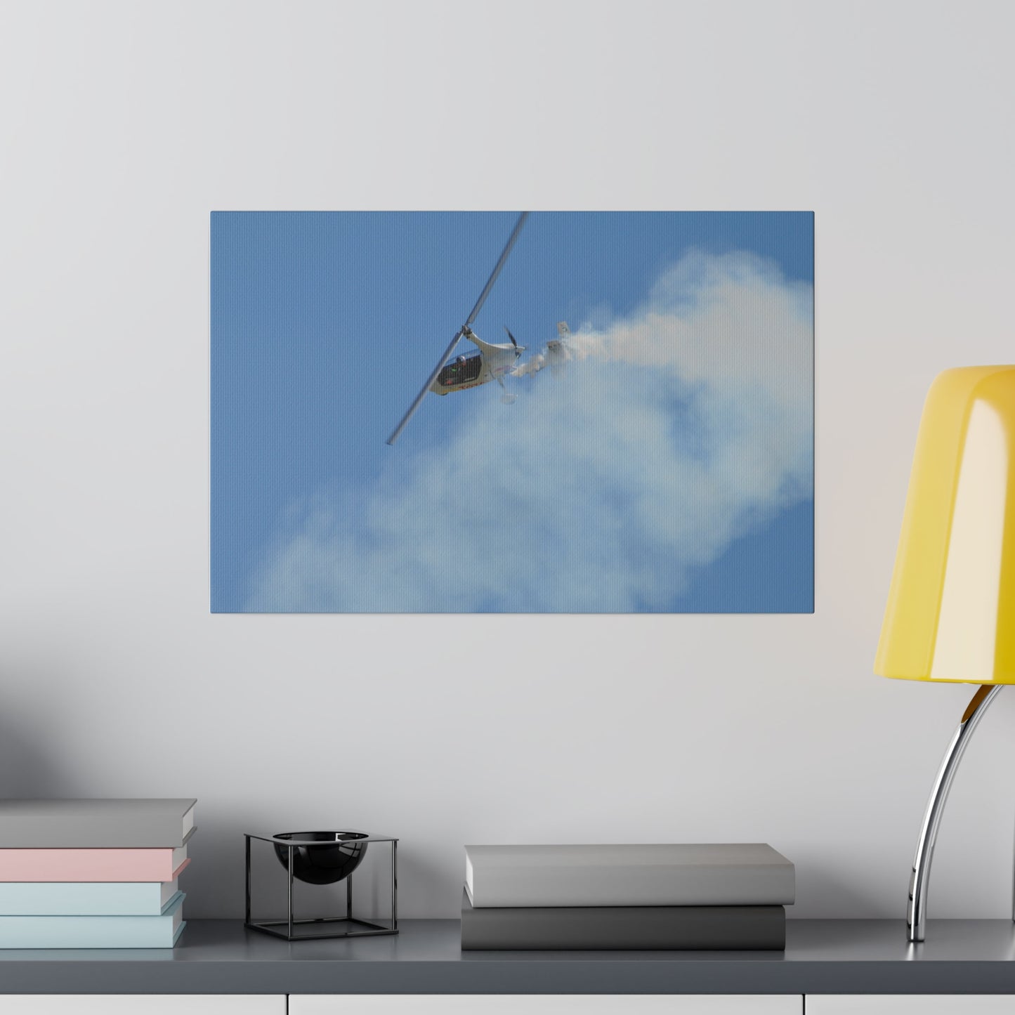 AutoGyro Flying With Smoke Looping Around Canvas - The Trio Synergize Group