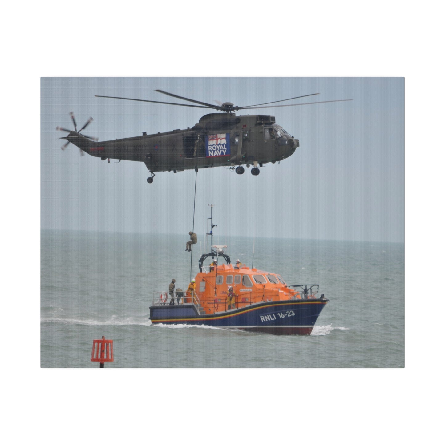 Sea King Helicopter Roping Down Crew Onto The RNLI Lifeboat Canvas