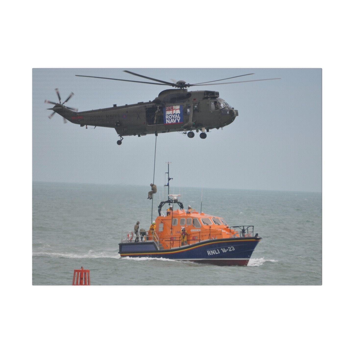 Sea King Helicopter Roping Down Crew Onto The RNLI Lifeboat Canvas