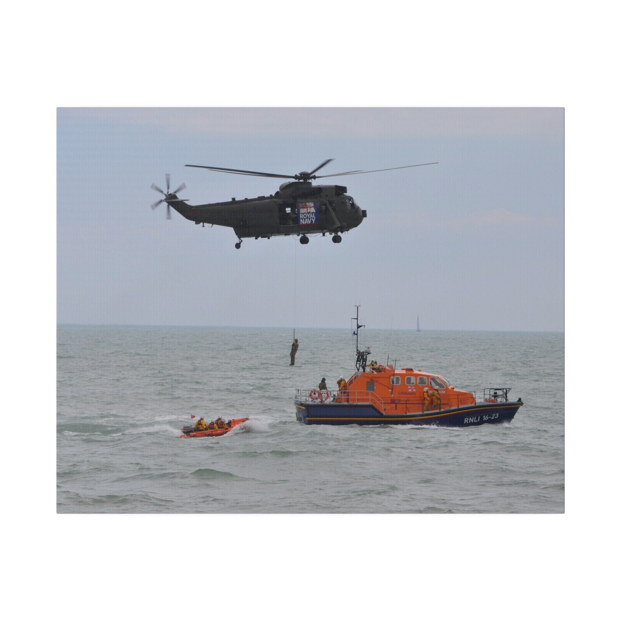 Sea King Helicopter Winching Crew Off RNLI Lifeboats Canvas - The Trio Synergize Group