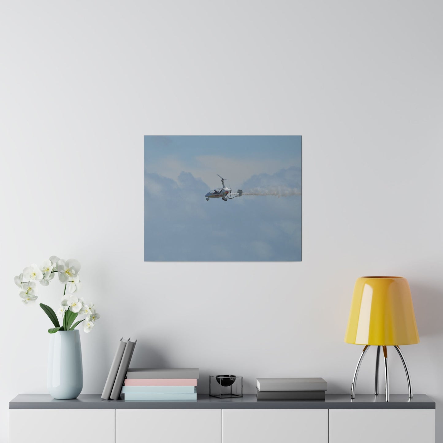AutoGyro Flying From The Right With Smoke, Matte Canvas, Stretched, 0.75" - The Trio Synergize Group