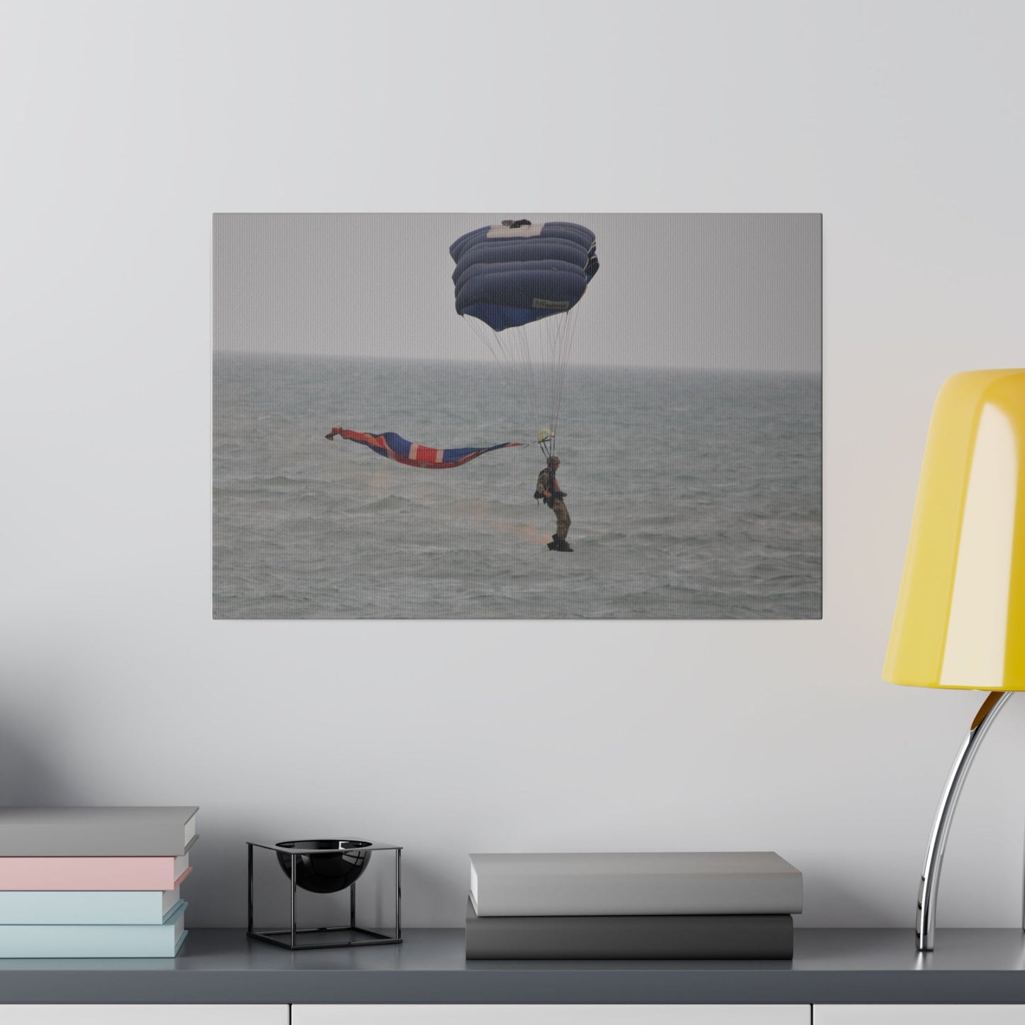 Parachuter With Flag And Smoke Just Above The Sea Canvas - The Trio Synergize Group