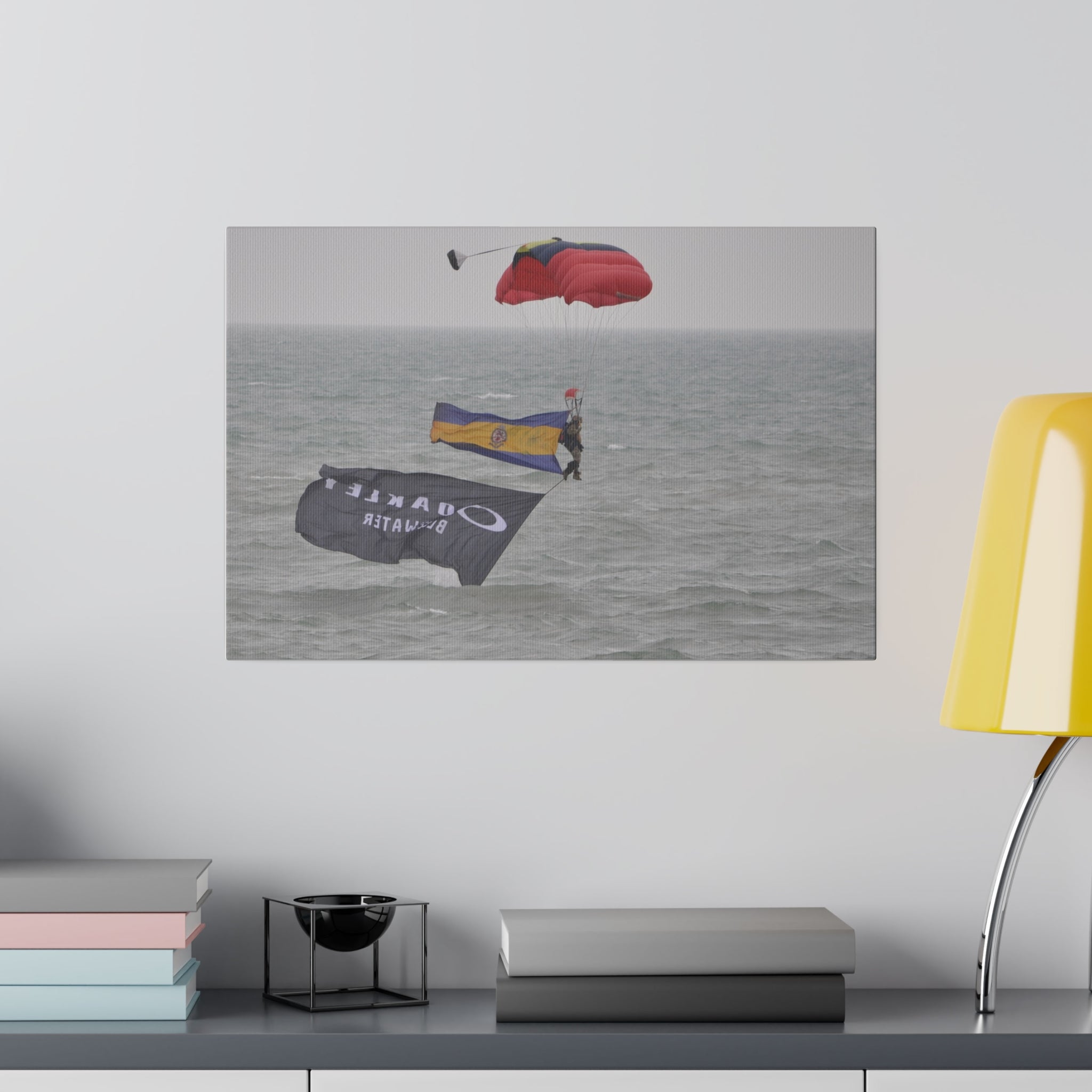 Parachuter With Flags Just Above The Sea Canvas - The Trio Synergize Group