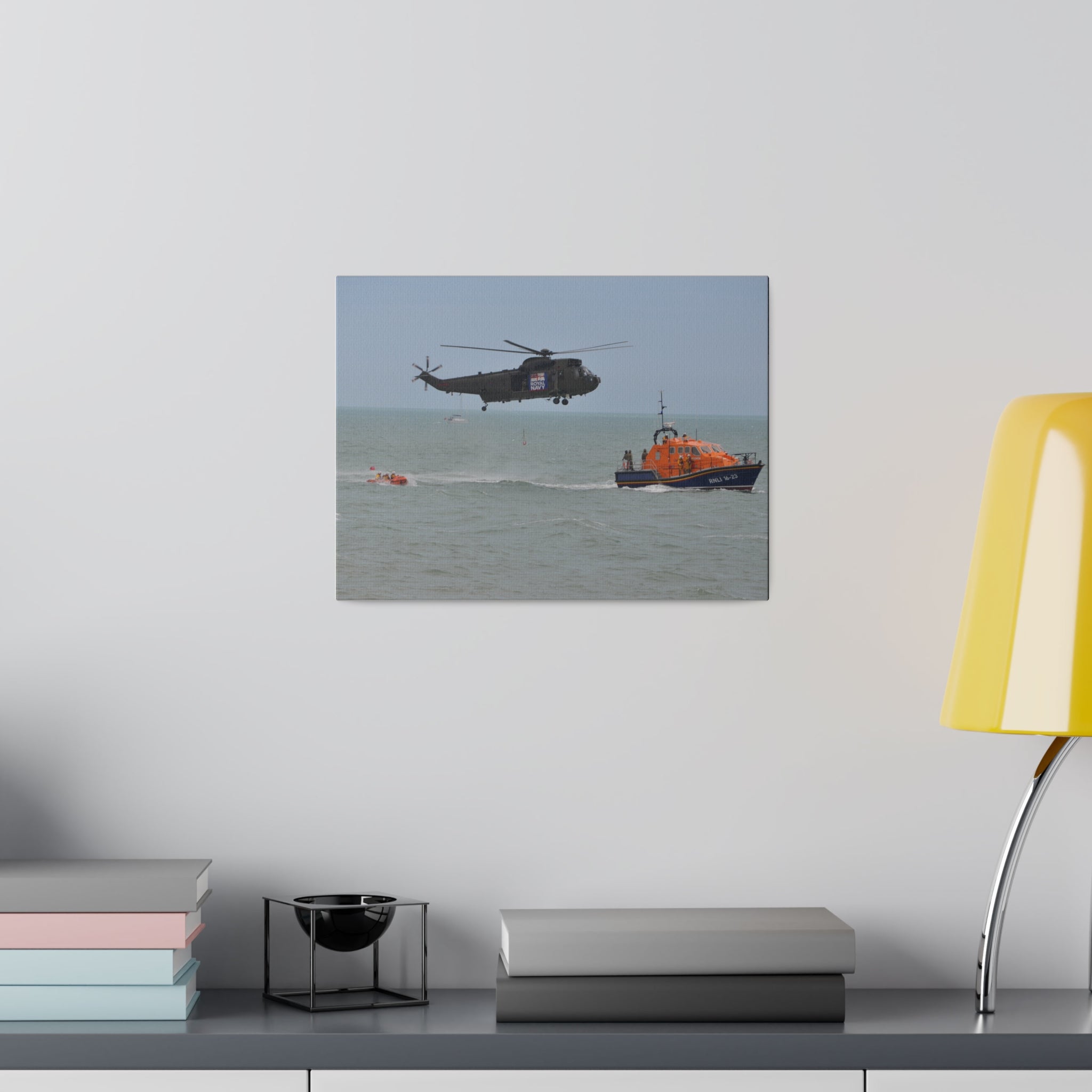 Sea King Helicopter Lowers Winch near RNLI Lifeboats Canvas - The Trio Synergize Group