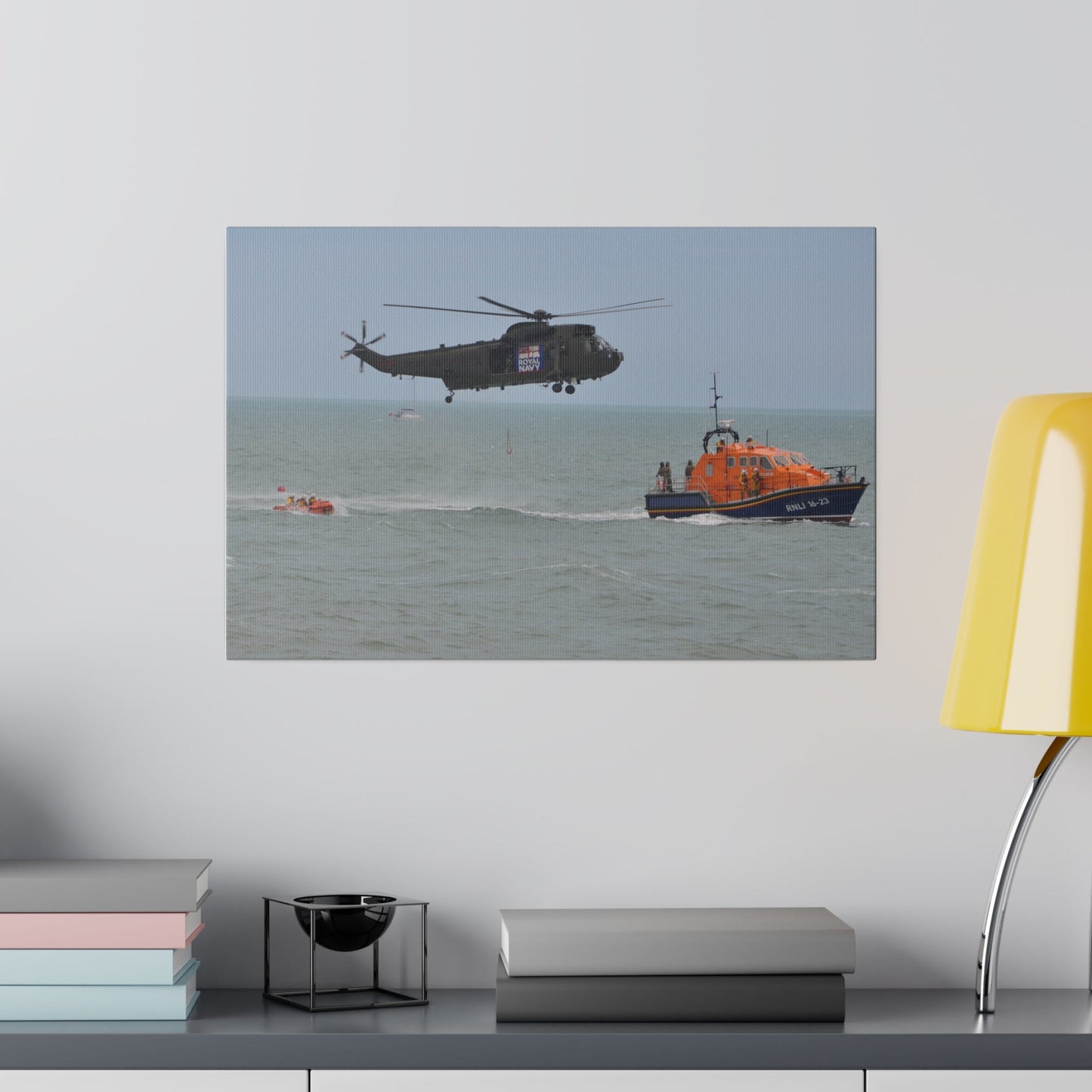 Sea King Helicopter Lowers Winch near RNLI Lifeboats Canvas - The Trio Synergize Group