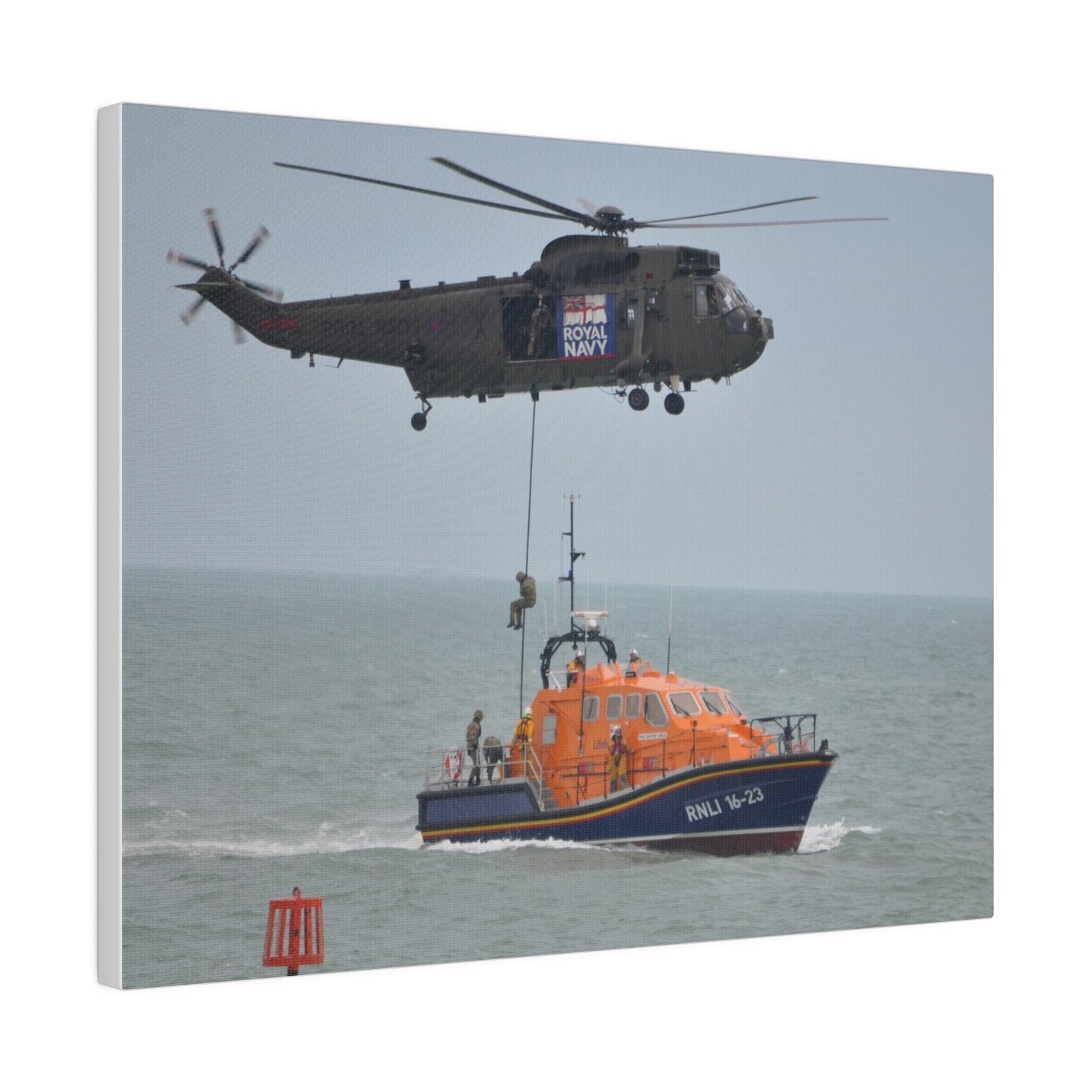Sea King Helicopter Roping Down Crew Onto The RNLI Lifeboat, Matte Canvas, Stretched, 0.75" - The Trio Synergize Group