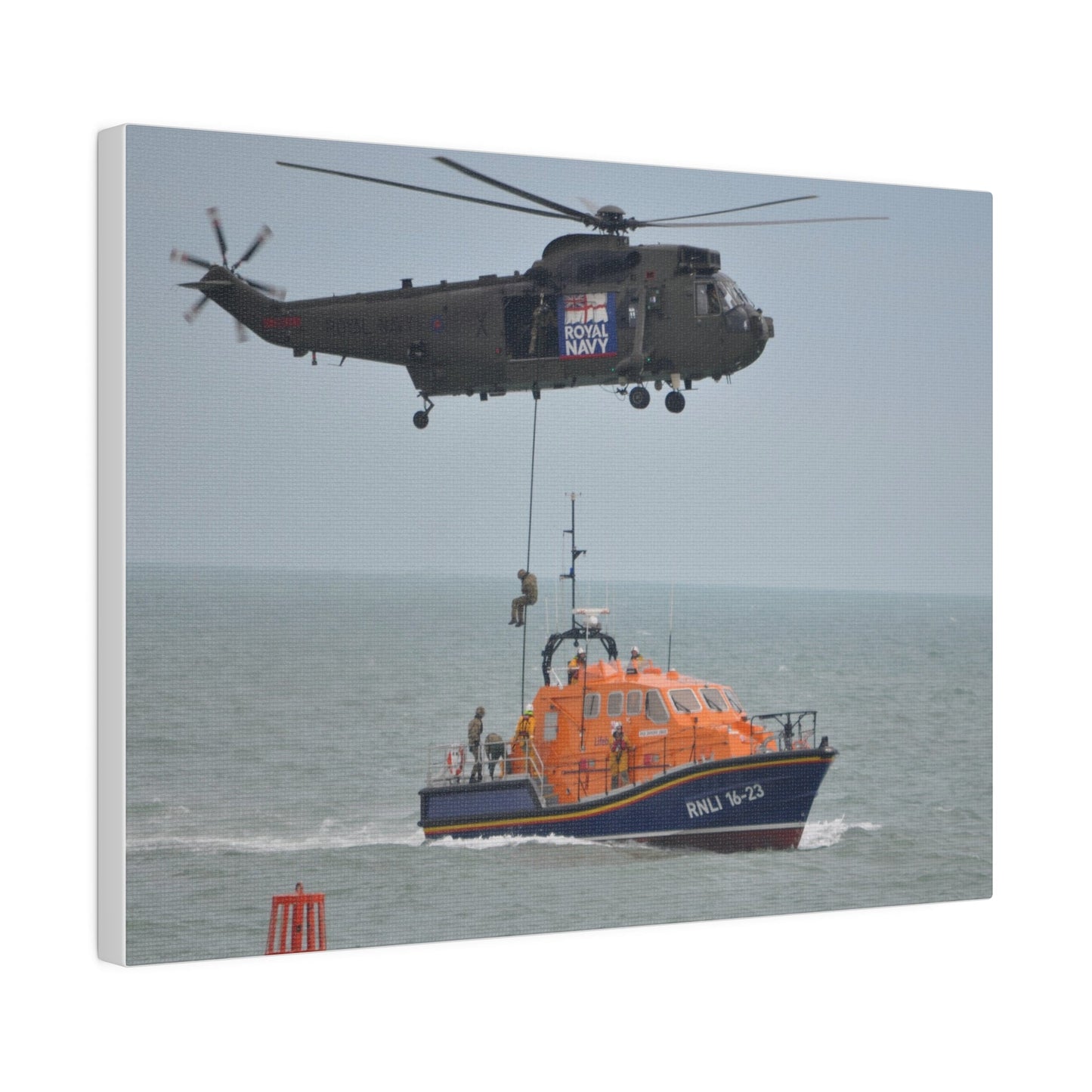 Sea King Helicopter Roping Down Crew Onto The RNLI Lifeboat, Matte Canvas, Stretched, 0.75" - The Trio Synergize Group
