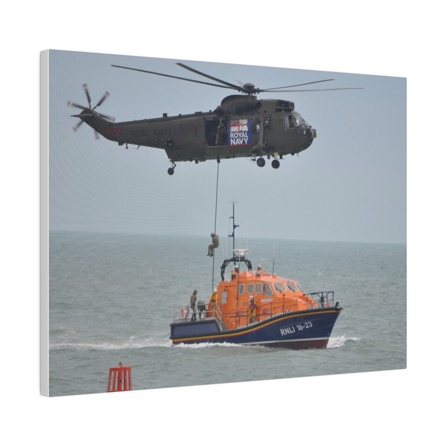 Sea King Helicopter Roping Down Crew Onto The RNLI Lifeboat, Matte Canvas, Stretched, 0.75" - The Trio Synergize Group