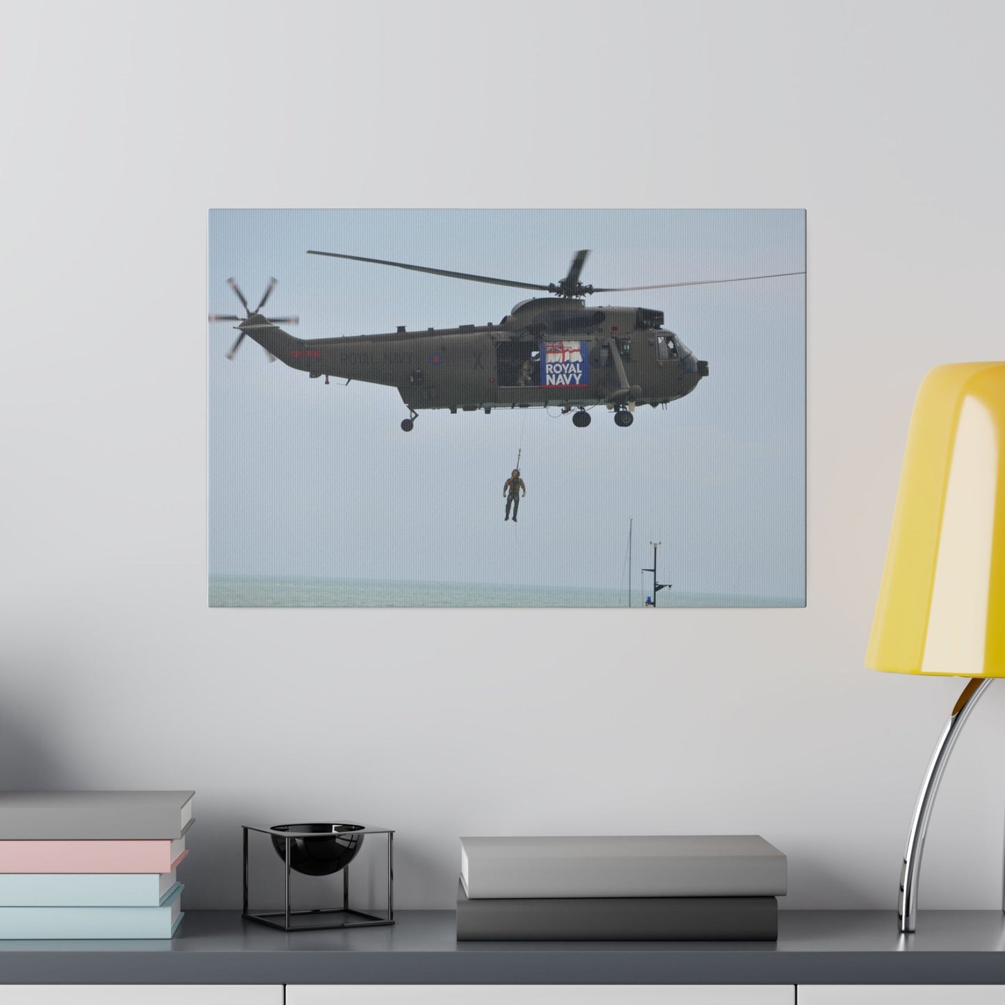 Sea King Helicopter Winching A Crew Member Mid-Air Canvas - The Trio Synergize Group