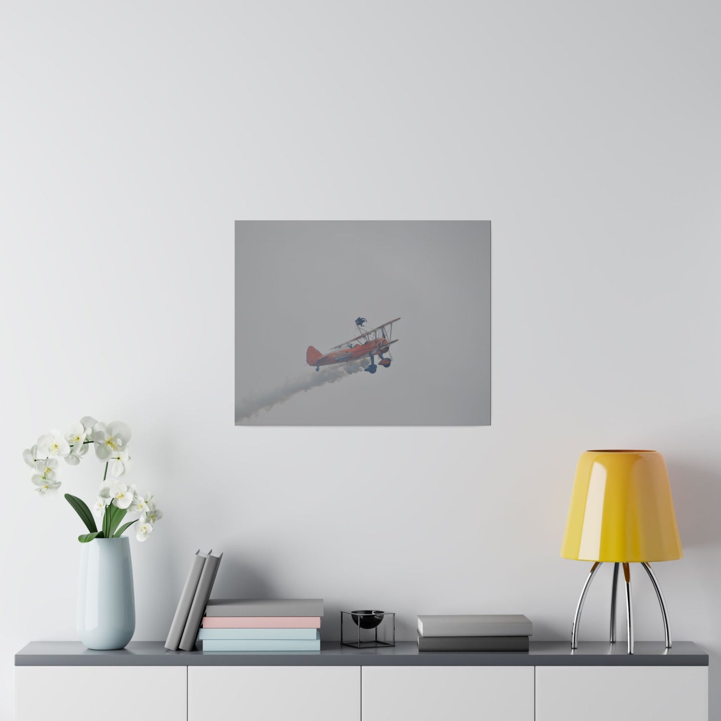 Single Wing Walker Flying From The Left With Side View Ascending, With Smoke And Person Laying Sideways Close Up, Matte Canvas, Stretched, 0.75" - The Trio Synergize Group