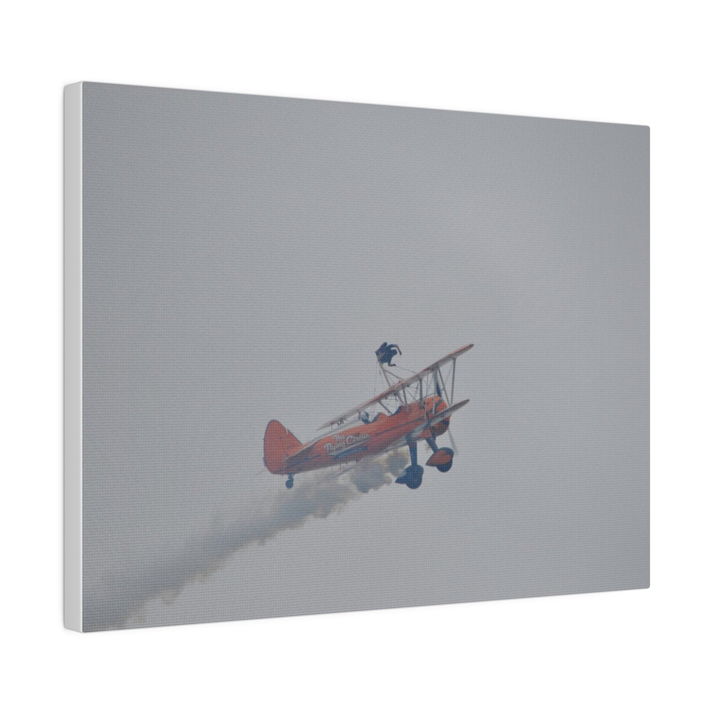 Single Wing Walker Flying From The Left With Side View Ascending, With Smoke And Person Laying Sideways Close Up, Matte Canvas, Stretched, 0.75" - The Trio Synergize Group