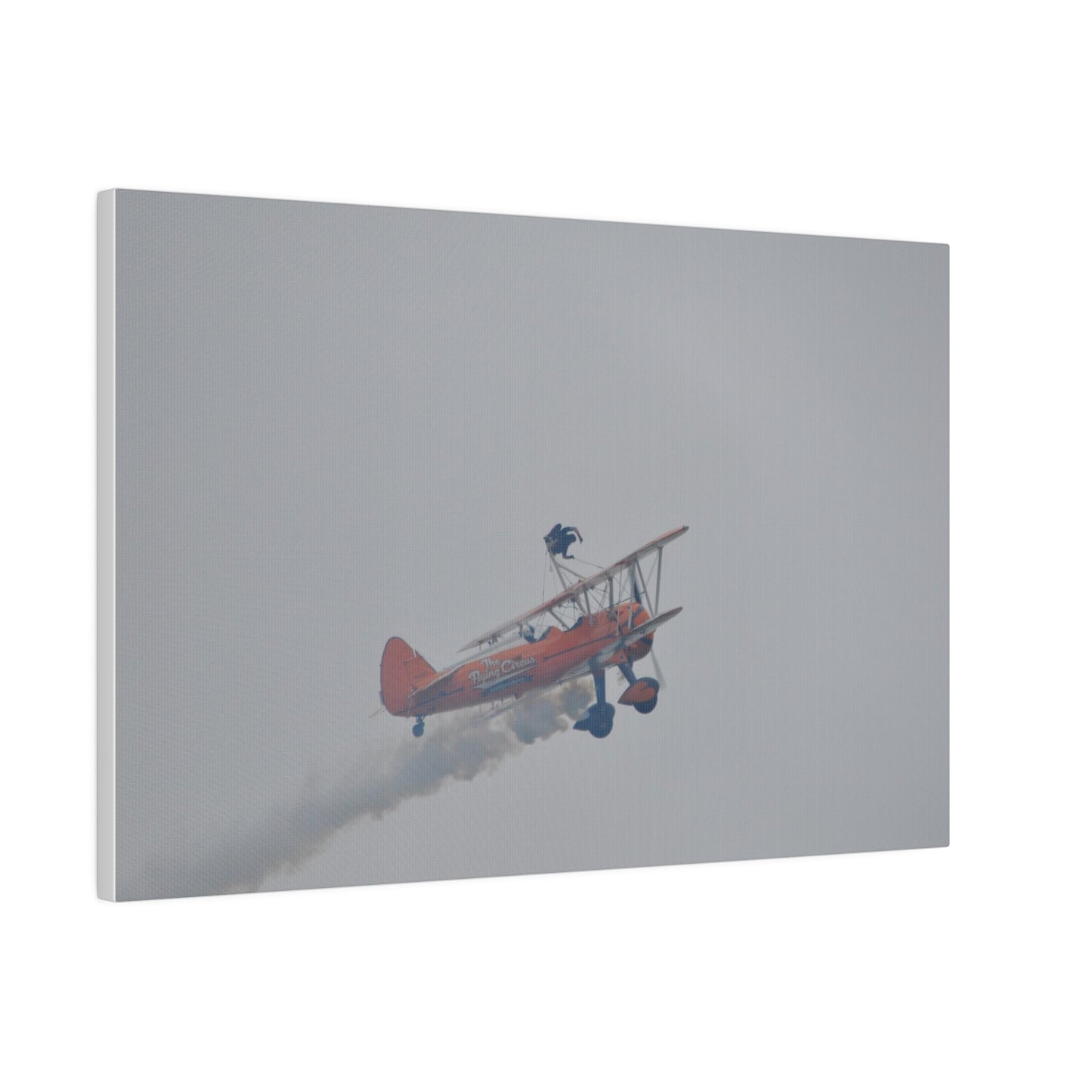 Single Wing Walker Flying From The Left With Side View Ascending, With Smoke And Person Laying Sideways Close Up, Matte Canvas, Stretched, 0.75" - The Trio Synergize Group