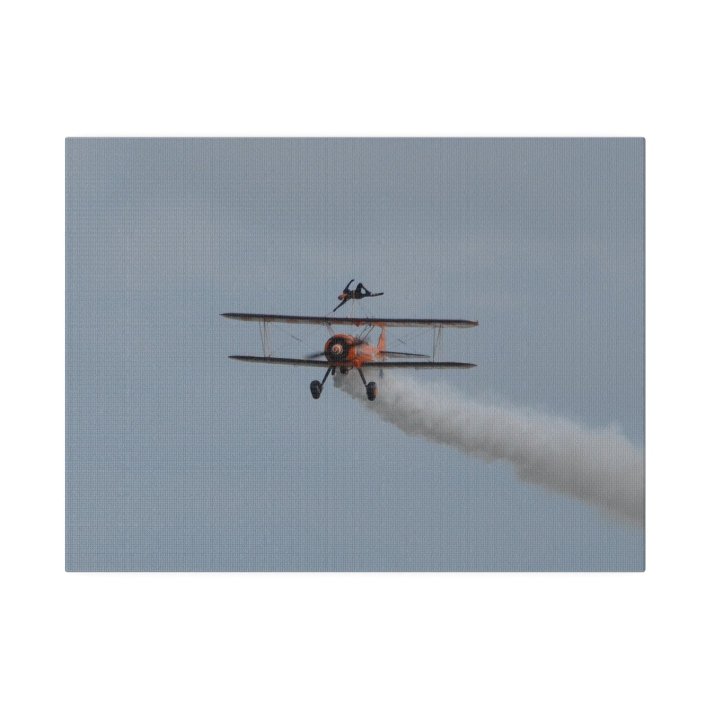 Single Wing Walker Flying Straight Forward With Smoke, With The Person Laying Sideways, Matte Canvas, Stretched, 0.75" - The Trio Synergize Group