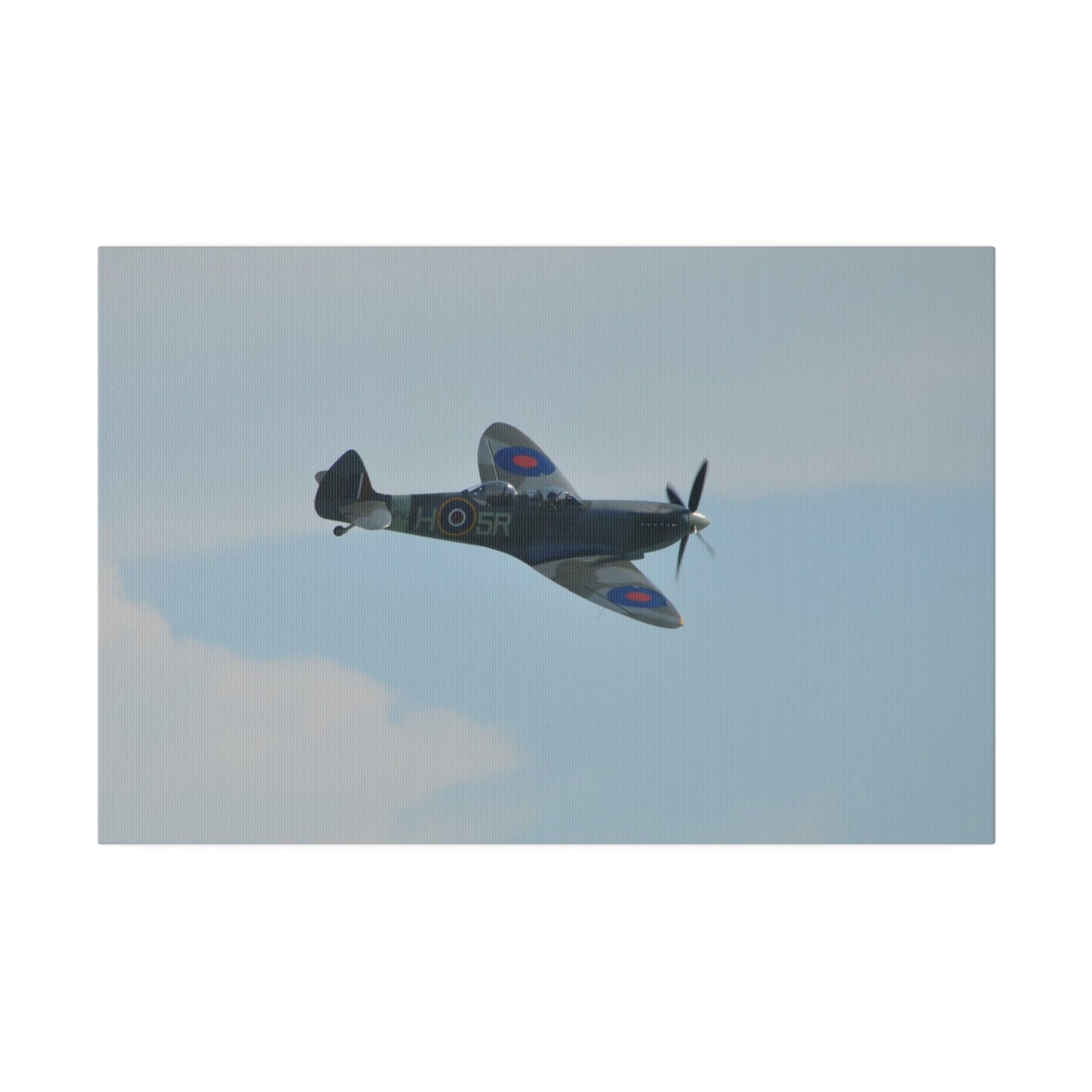 Supermarine Spitfire Two - Seater Flying From The Left With A Slight Angle Close Up, Matte Canvas, Stretched, 0.75" - The Trio Synergize Group