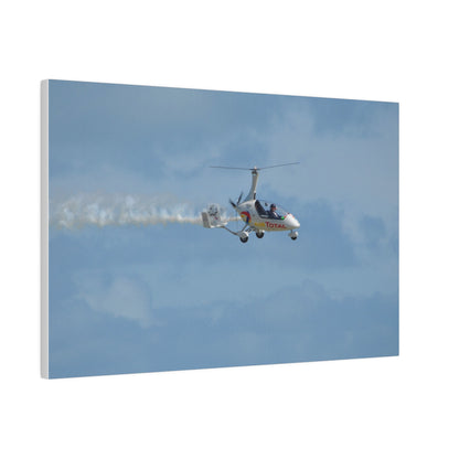 AutoGyro Flying From The Left With Smoke, Pilot Looking Over Canvas