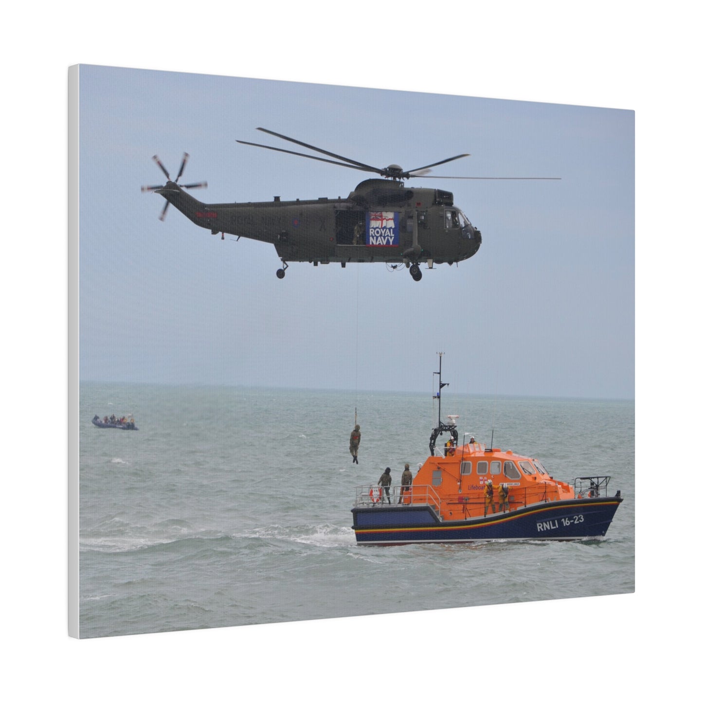 Sea King Helicopter Winching Crew Off RNLI Lifeboat - Canvas - The Trio Synergize Group