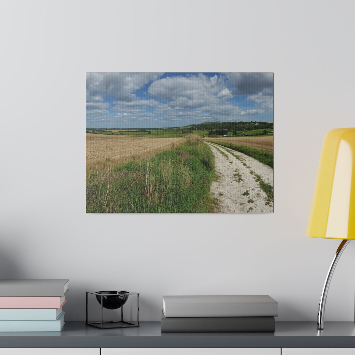 Countryside Field Landscape With Hill In The Background and Fluffy Clouds Canvas