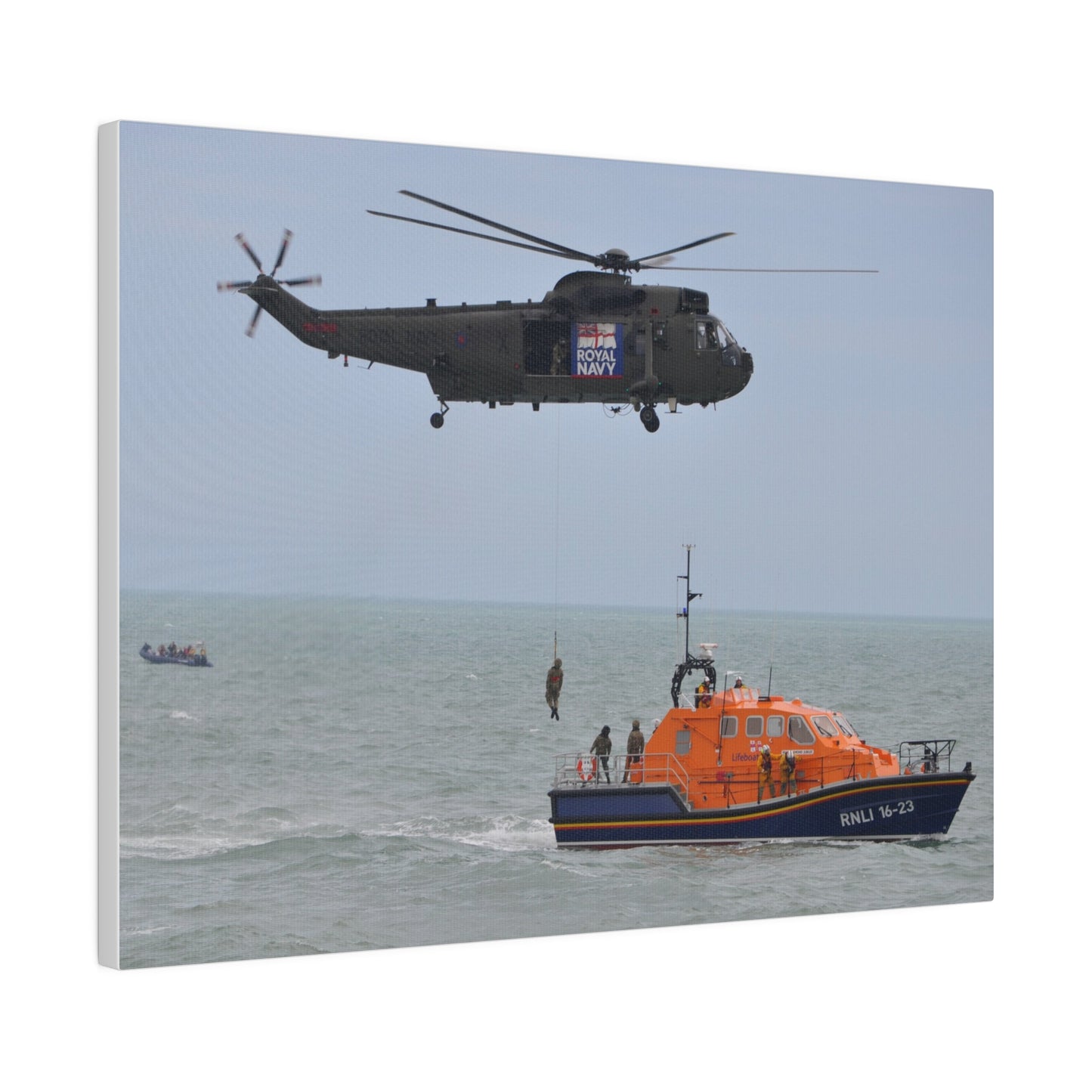 Sea King Helicopter Winching Crew Off RNLI Lifeboat - Canvas - The Trio Synergize Group