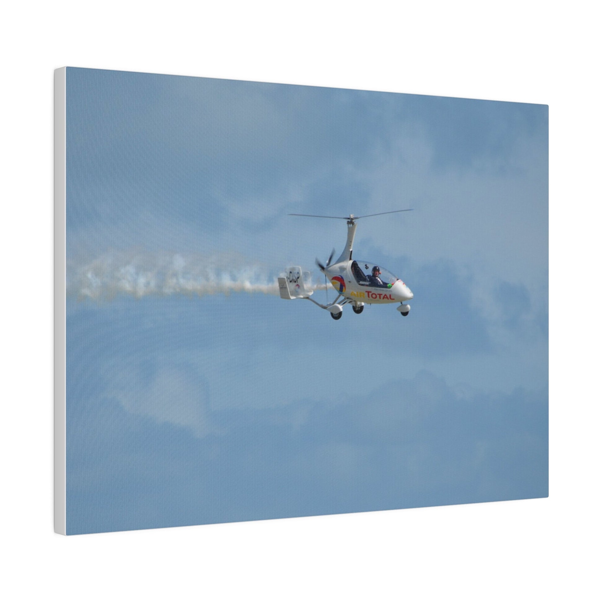 AutoGyro Flying From The Left With Smoke, Pilot Looking Over, Matte Canvas, Stretched, 0.75" - The Trio Synergize Group