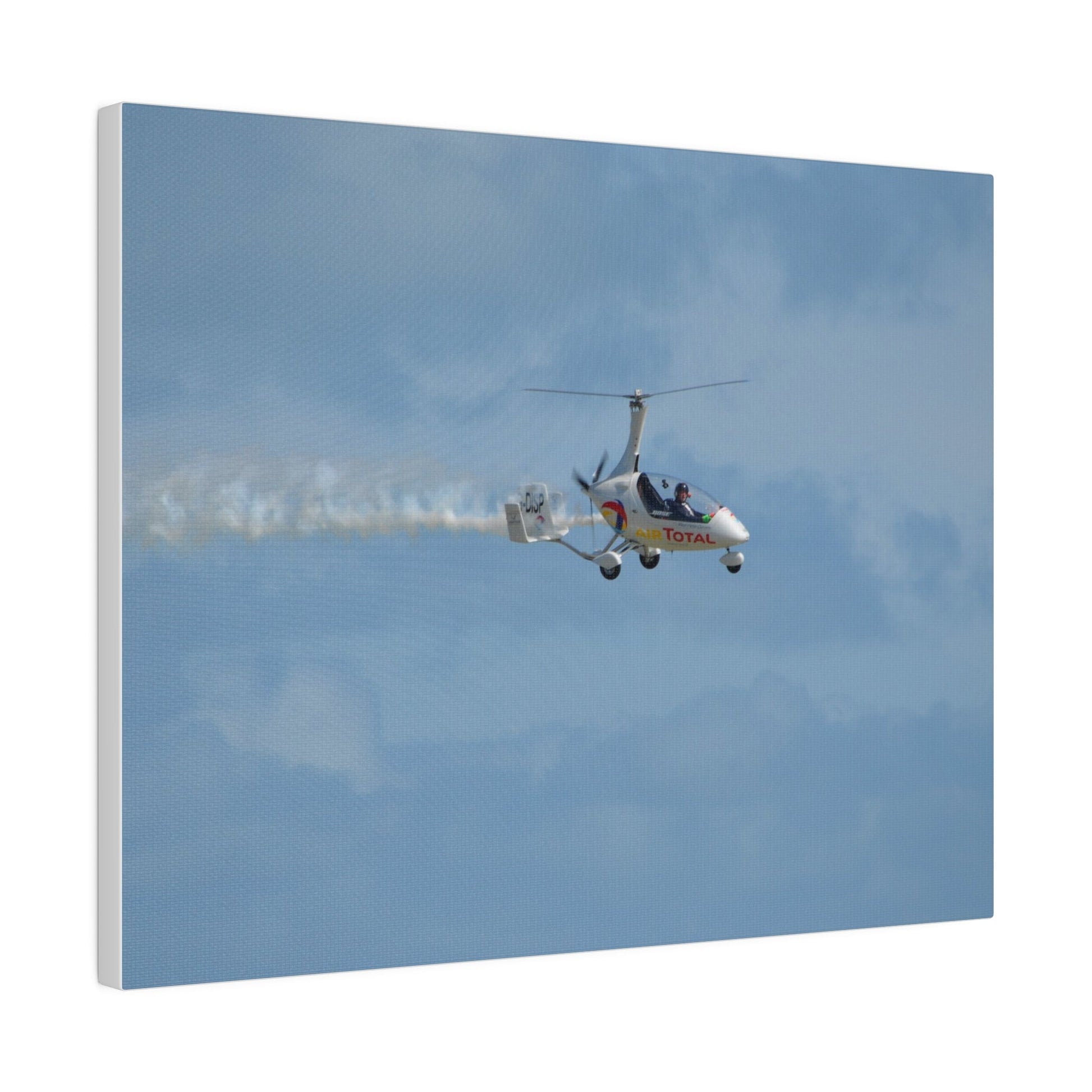 AutoGyro Flying From The Left With Smoke, Pilot Looking Over, Matte Canvas, Stretched, 0.75" - The Trio Synergize Group