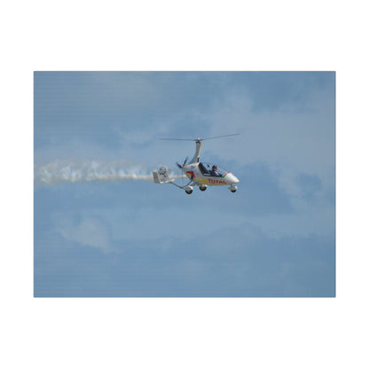 AutoGyro Flying From The Left With Smoke, Pilot Looking Over, Matte Canvas, Stretched, 0.75" - The Trio Synergize Group