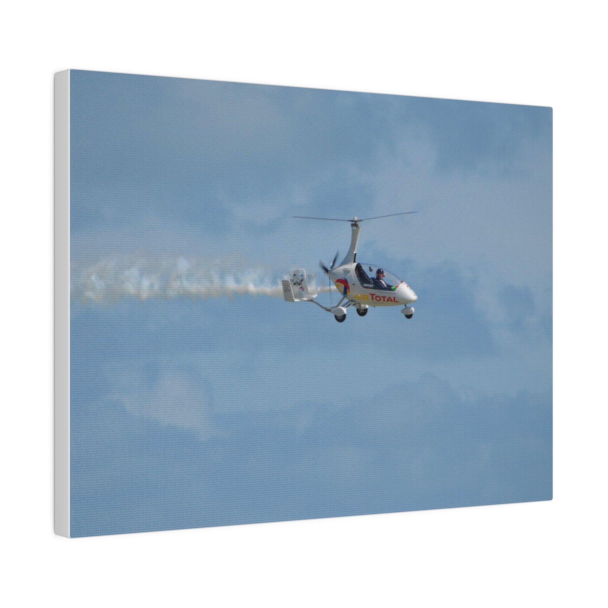 AutoGyro Flying From The Left With Smoke, Pilot Looking Over, Matte Canvas, Stretched, 0.75" - The Trio Synergize Group