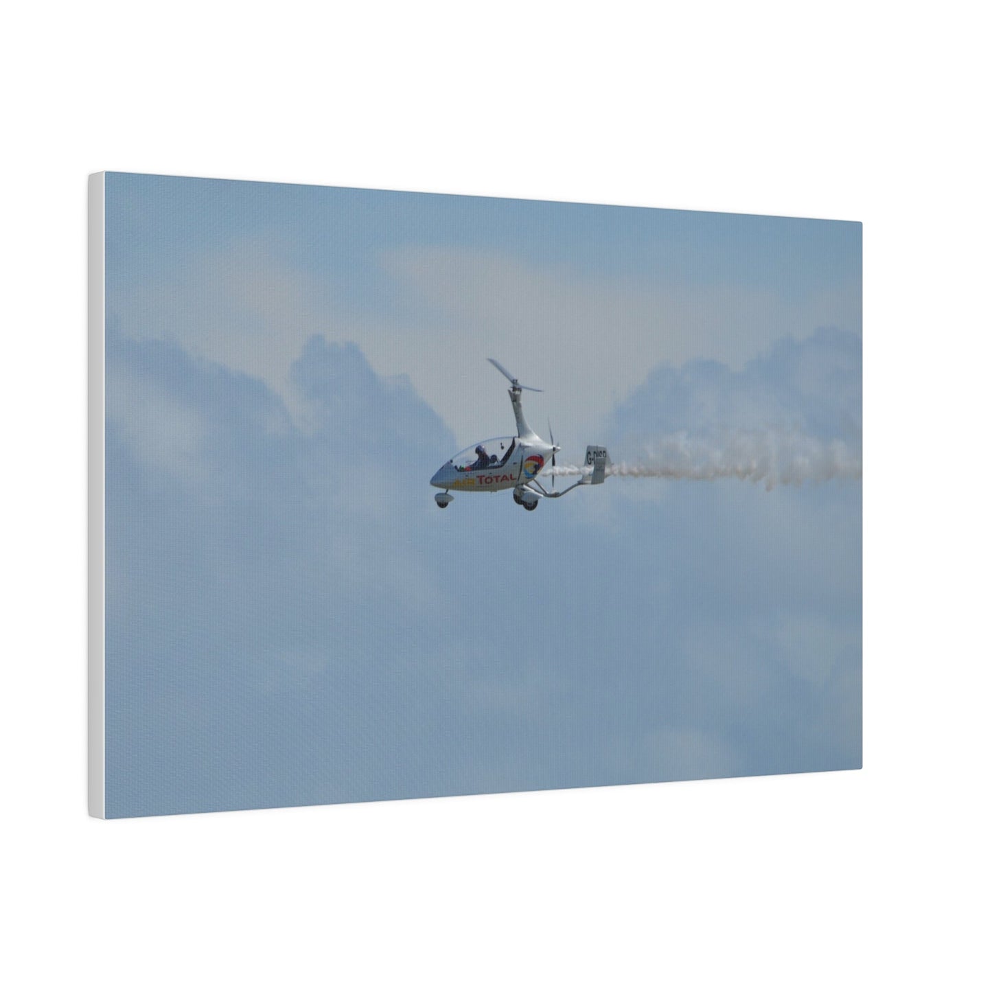 AutoGyro Flying From The Right With Smoke, Matte Canvas, Stretched, 0.75" - The Trio Synergize Group