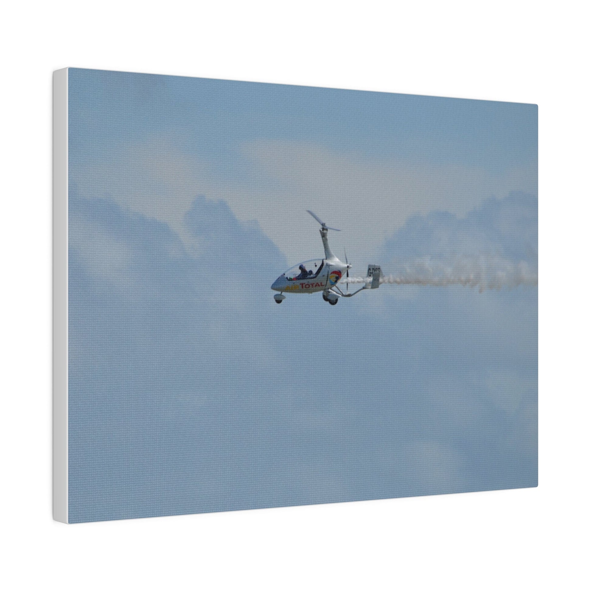 AutoGyro Flying From The Right With Smoke, Matte Canvas, Stretched, 0.75" - The Trio Synergize Group