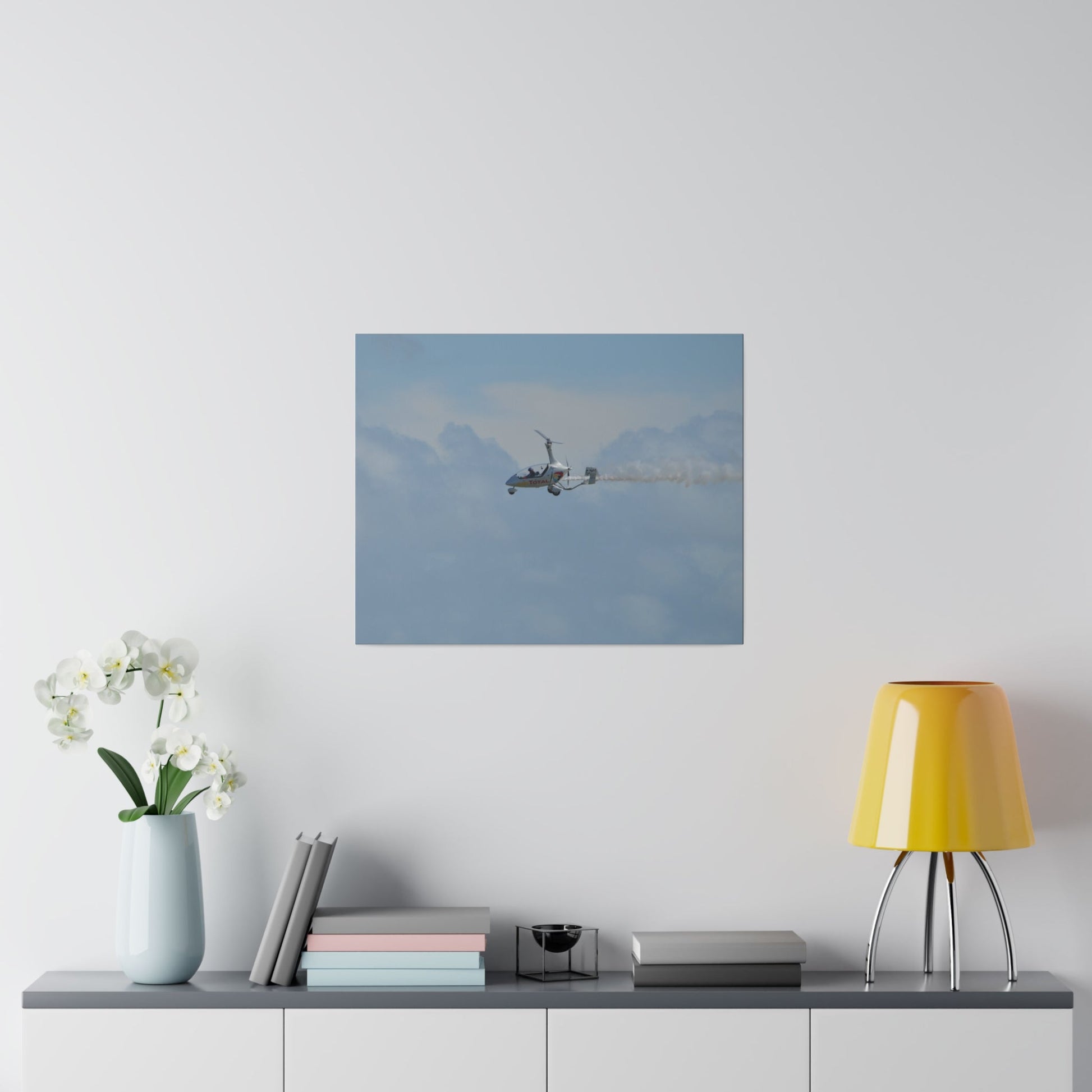 AutoGyro Flying From The Right With Smoke, Matte Canvas, Stretched, 0.75" - The Trio Synergize Group