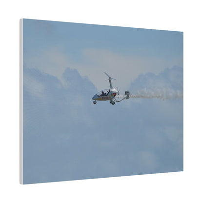 AutoGyro Flying From The Right With Smoke, Matte Canvas, Stretched, 0.75" - The Trio Synergize Group