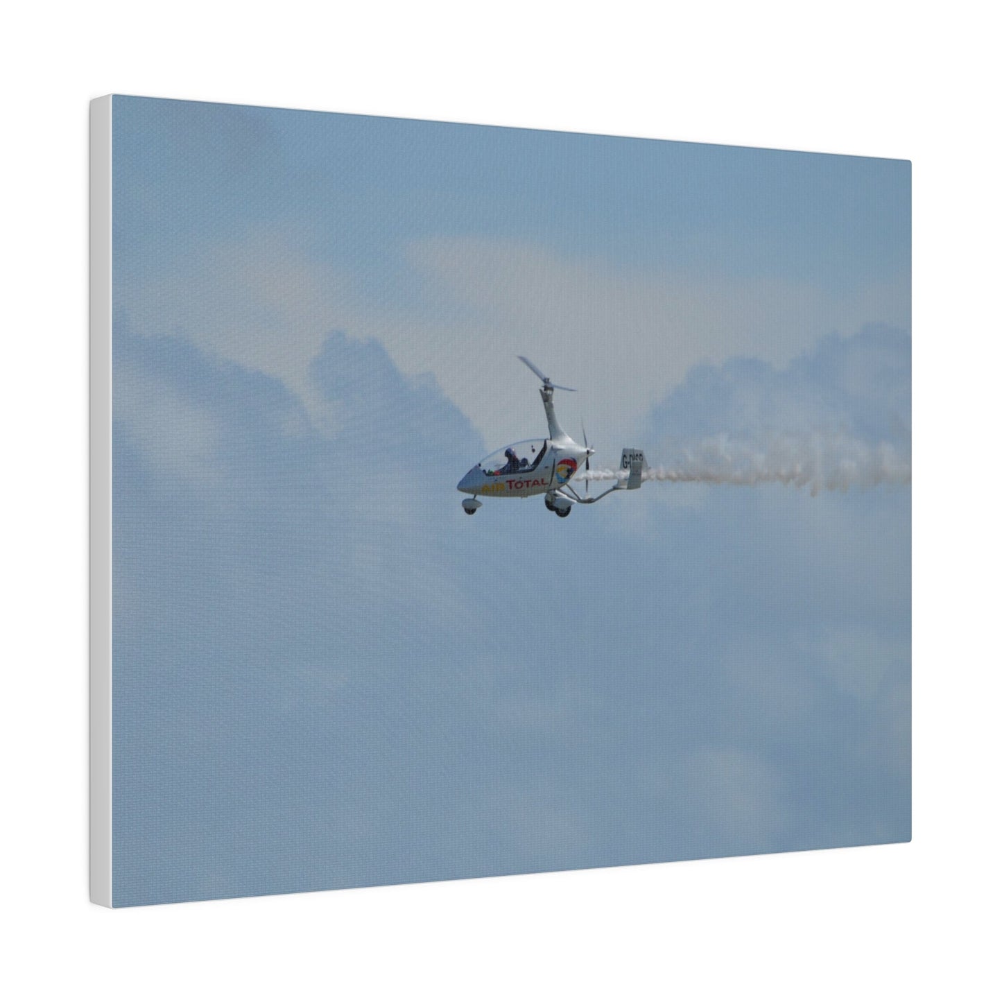 AutoGyro Flying From The Right With Smoke, Matte Canvas, Stretched, 0.75" - The Trio Synergize Group