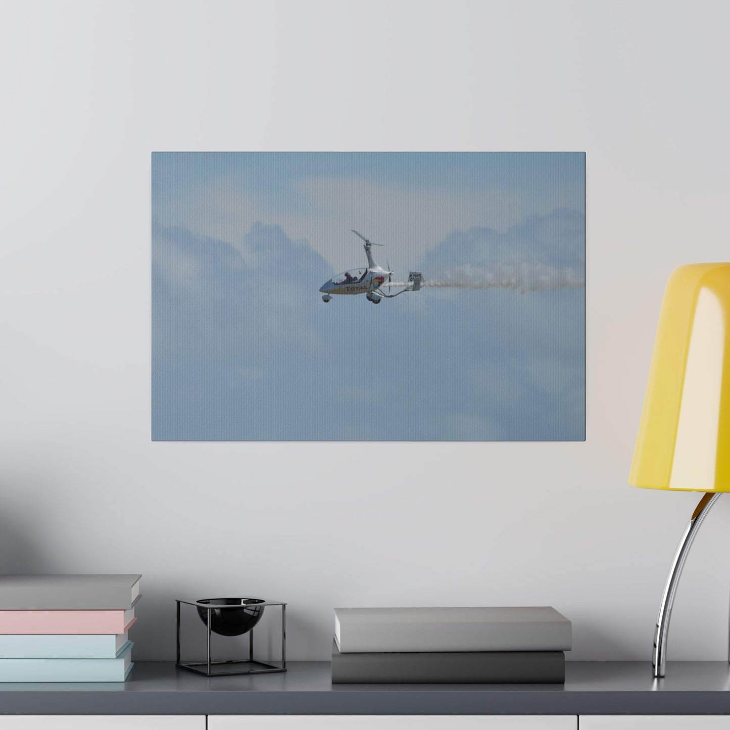AutoGyro Flying From The Right With Smoke, Matte Canvas, Stretched, 0.75" - The Trio Synergize Group