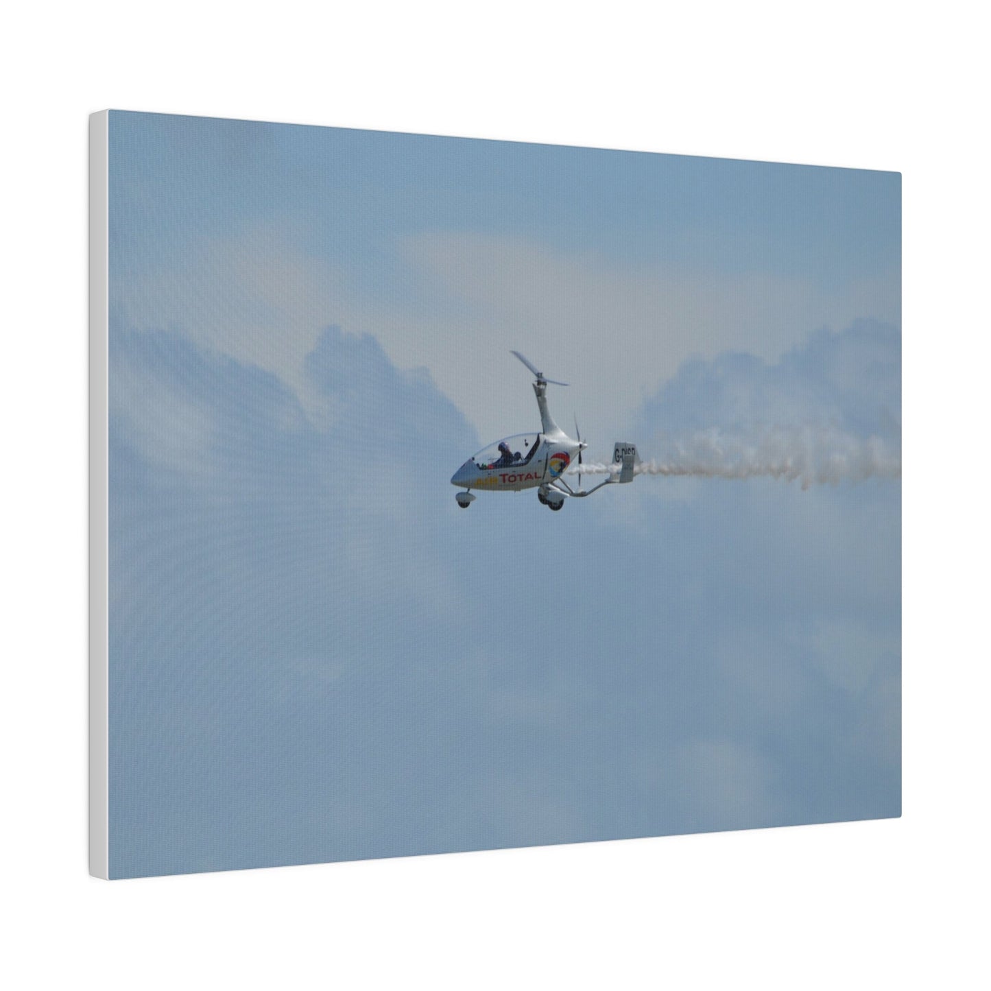 AutoGyro Flying From The Right With Smoke, Matte Canvas, Stretched, 0.75" - The Trio Synergize Group
