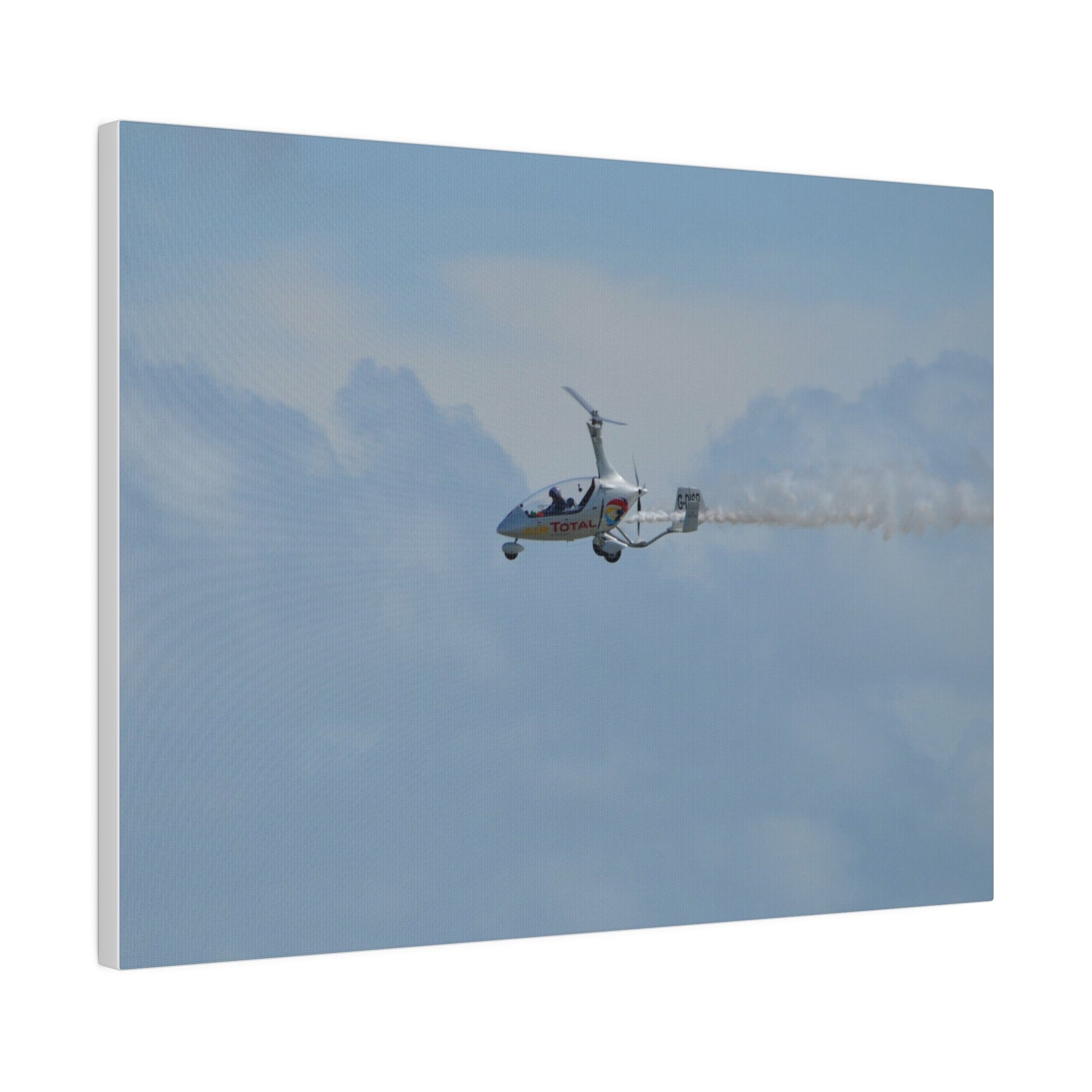 AutoGyro Flying From The Right With Smoke, Matte Canvas, Stretched, 0.75" - The Trio Synergize Group
