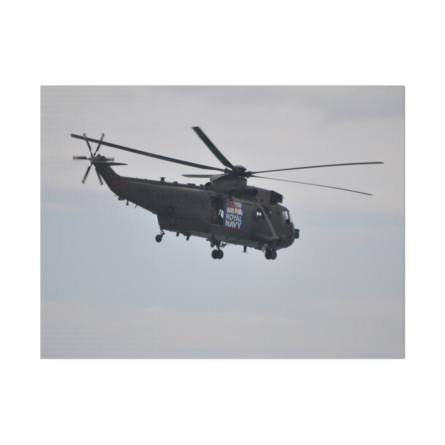 Sea King Helicopter Hovering With Rear And Side View, Matte Canvas, Stretched, 0.75" - The Trio Synergize Group