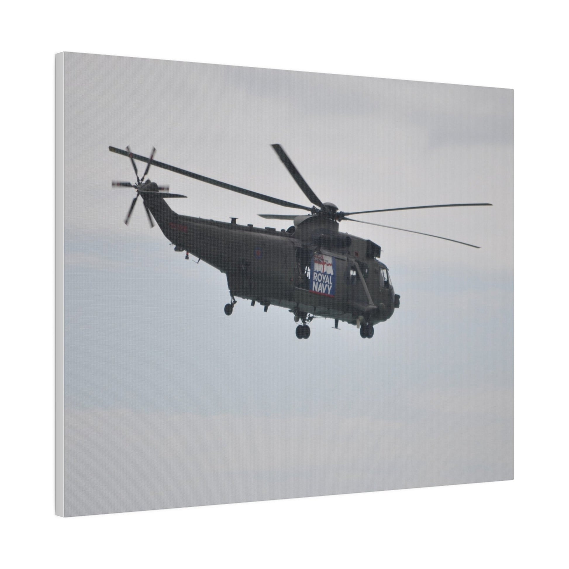 Sea King Helicopter Hovering With Rear And Side View, Matte Canvas, Stretched, 0.75" - The Trio Synergize Group