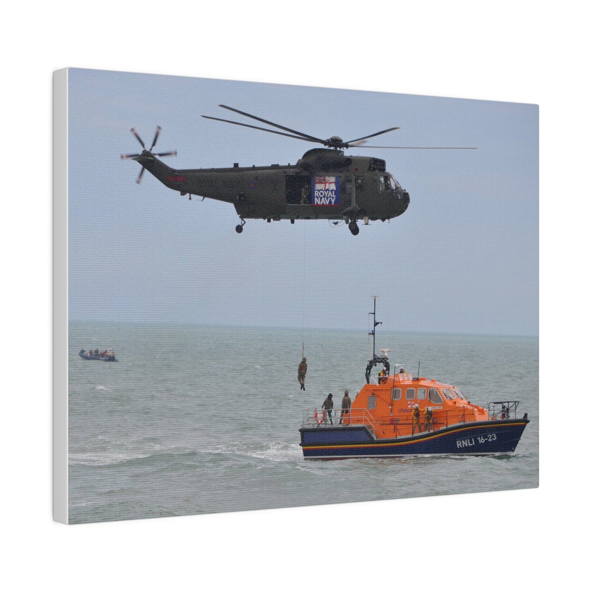 Sea King Helicopter Winching Crew Off RNLI Lifeboat - Canvas - The Trio Synergize Group