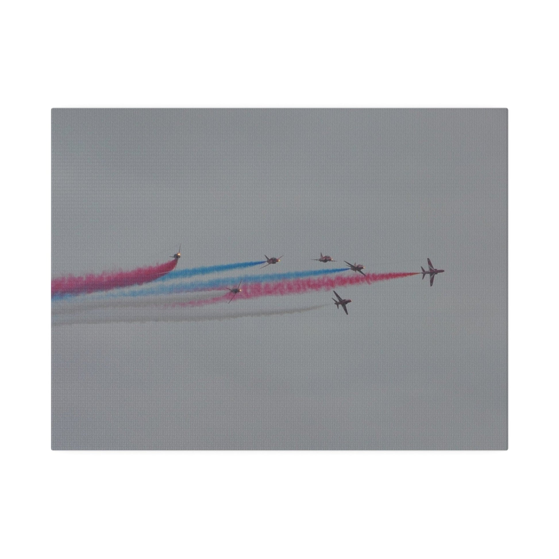 Seven Red Arrows Flying From The Left In Formation With slight Angles And With Blue, White And Red Smoke Close To Each Other, Matte Canvas, Stretched, 0.75" - The Trio Synergize Group