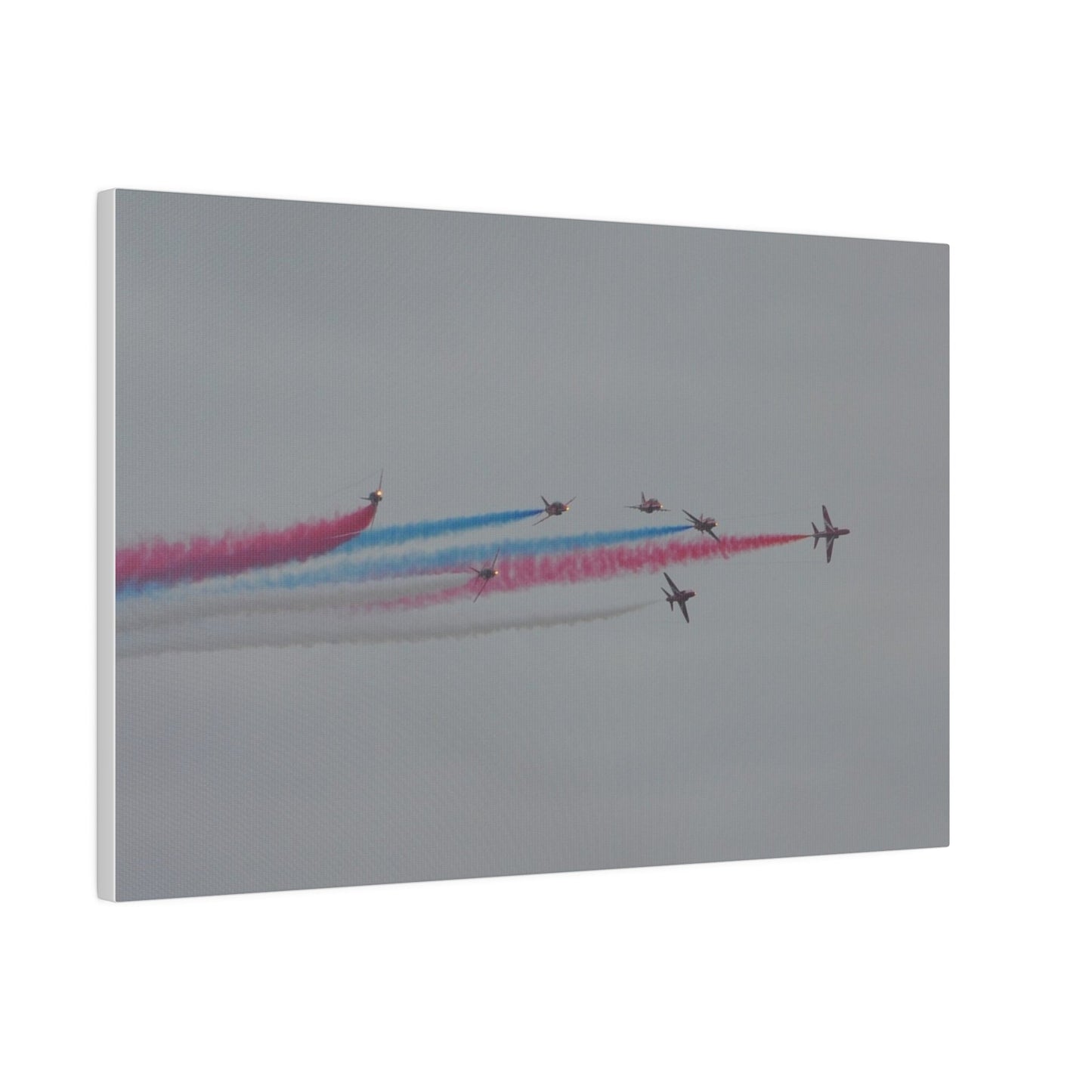 Seven Red Arrows Flying From The Left In Formation With slight Angles And With Blue, White And Red Smoke Close To Each Other, Matte Canvas, Stretched, 0.75" - The Trio Synergize Group