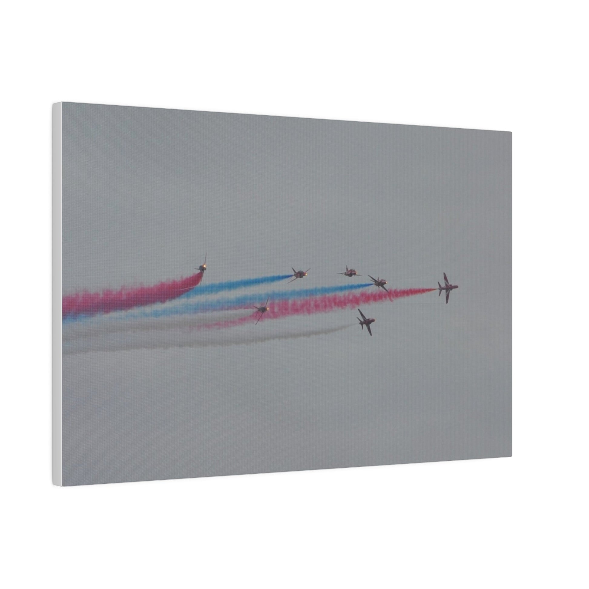 Seven Red Arrows Flying From The Left In Formation With slight Angles And With Blue, White And Red Smoke Close To Each Other, Matte Canvas, Stretched, 0.75" - The Trio Synergize Group