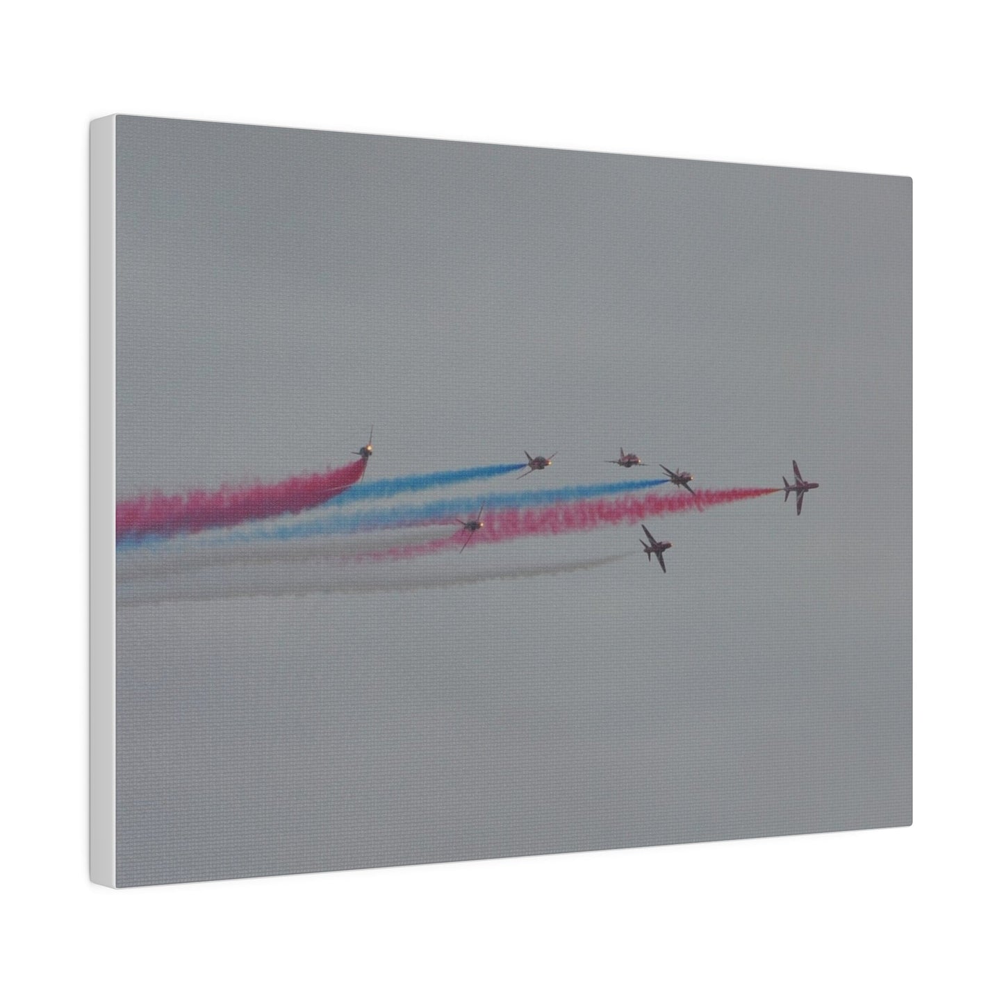 Seven Red Arrows Flying From The Left In Formation With slight Angles And With Blue, White And Red Smoke Close To Each Other, Matte Canvas, Stretched, 0.75" - The Trio Synergize Group