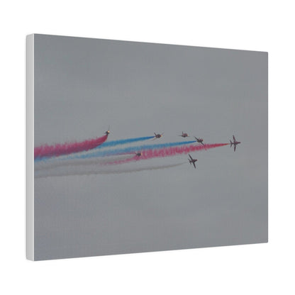 Seven Red Arrows Flying From The Left In Formation With slight Angles And With Blue, White And Red Smoke Close To Each Other, Matte Canvas, Stretched, 0.75" - The Trio Synergize Group