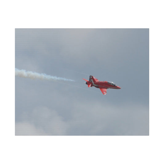 The Red Arrow Flying Right With White Smoke Close Up Canvas - The Trio Synergize Group