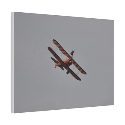 Single Wing Walker Flying From The Left, Front View Much Closer, Person Holding Their Right Leg, Matte Canvas, Stretched, 0.75" - The Trio Synergize Group