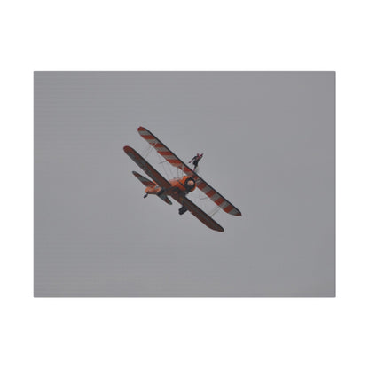 Single Wing Walker Flying From The Left, Front View Much Closer, Person Holding Their Right Leg, Matte Canvas, Stretched, 0.75" - The Trio Synergize Group