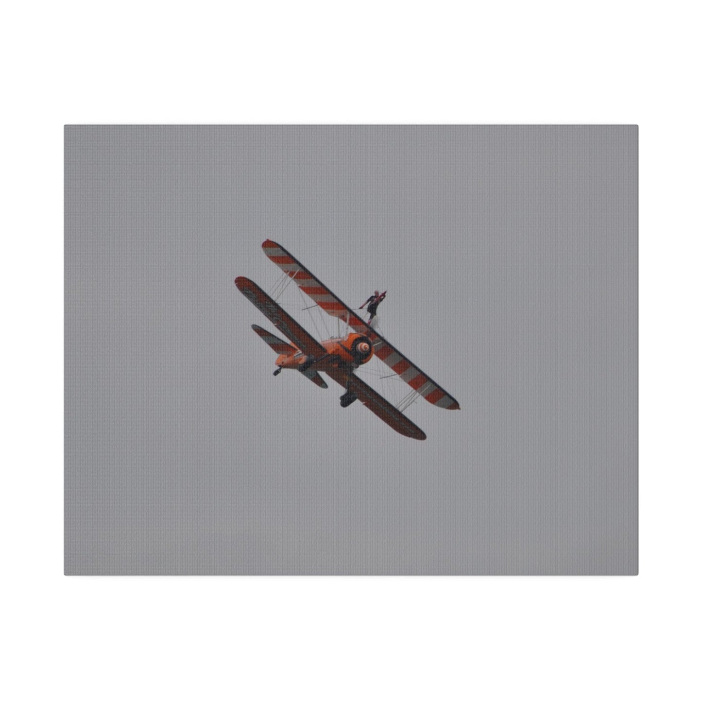 Single Wing Walker Flying From The Left, Front View Much Closer, Person Holding Their Right Leg, Matte Canvas, Stretched, 0.75" - The Trio Synergize Group
