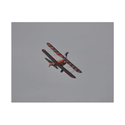 Single Wing Walker Flying From The Left, Front View Much Closer, Person Holding Their Right Leg, Matte Canvas, Stretched, 0.75" - The Trio Synergize Group