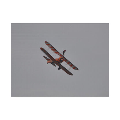 Single Wing Walker Flying From The Left, Front View Much Closer, Person Holding Their Right Leg, Matte Canvas, Stretched, 0.75" - The Trio Synergize Group