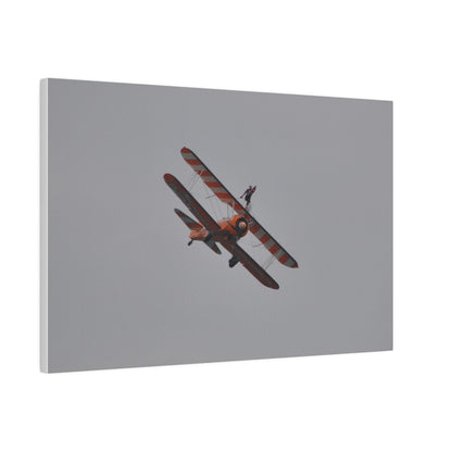 Single Wing Walker Flying From The Left, Front View Much Closer, Person Holding Their Right Leg, Matte Canvas, Stretched, 0.75" - The Trio Synergize Group